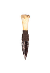 Obsidian knife with bone handle isolate on a white back. Prehistoric weapon made of volcanic glass.