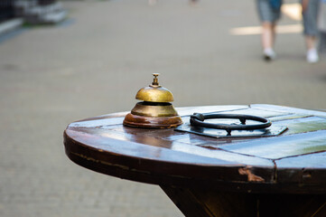 old wooden order table in an outdoor cafe
