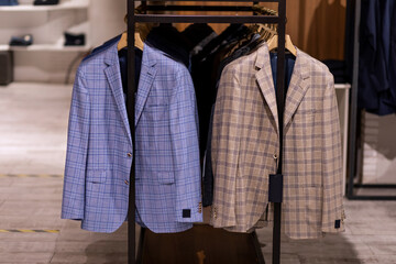 Fototapeta na wymiar Men suits in a luxury clothing store