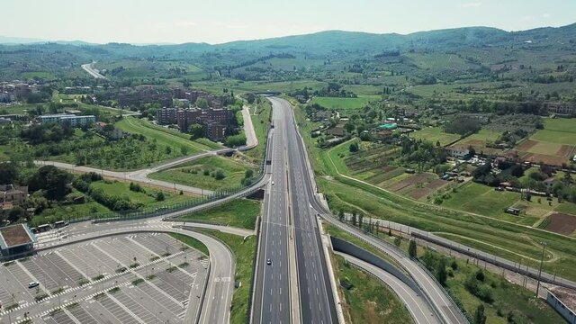 AERIAL WS Parking lot and empty highways amid Coronavirus pandemic / Florence, Tuscany, Italy