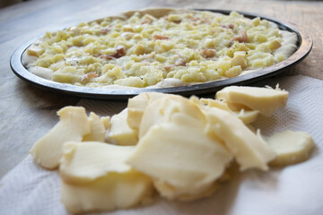 pizza with potatoes and cooked ham