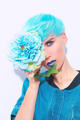 Fashion Girl with blue short hair. Trendy colours hair style concept
