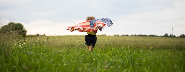 Patriotic holiday. Happy kid, cute little child girl with American flag.