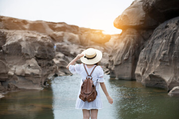 Toursit is traveling at Sam Pan Bok (Canyon of Thailand) in Ubon Ratchathani during summer vacation time.