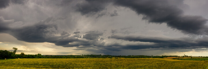 Fototapeta na wymiar Summer storm approaching over back pasture