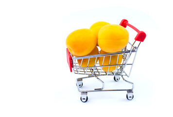 Apricots in a basket on a white background isolate