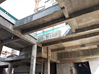 SEREMBAN, MALAYSIA -MARCH 7, 2020: Steel reinforced concrete structure is built at the construction site. Built using formworks made of wood and plywood. Manually build by the workers.