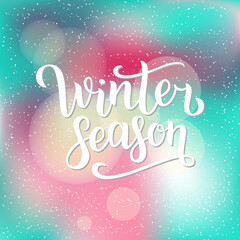 Winter season hand written inscription with isolated on blurred abstract background with snowflakes. Vector illustration. Lettering. Postcard for winter season advertising.