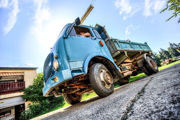 Blue italian truck stands on a street