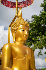 golden buddha image statue in south of Thailand