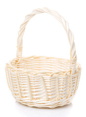 Beautiful handmade wicker basket isolated on white.