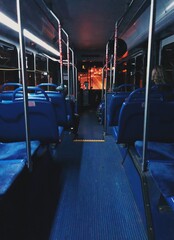 City bus riding at night on the back seat