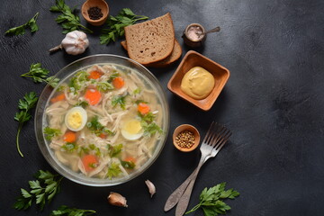 Home made aspic, jellied chicken meat with herbs and carrots. Traditional Russian dish holodets. Served with bread and mustard or/and horseradish