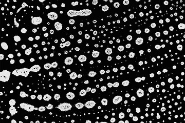 Suds soap foam bubble on black. White liquid abstract shampoo background. Clean water bath texture. Macro soft surface detergent pattern.
