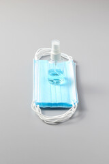 Surgical face mask, vector illustration. Blue medical protective masks, from different angles isolated on white. Corona virus protection mask with ear loop, in a front, three-quarters, and side views.