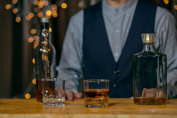 Barman pouring whiskey whiskey glass beautiful night