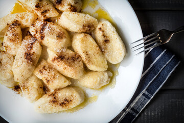 Lazy dumplings with cinnamon and sugar.