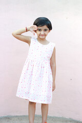 Indian girl standing and saluting. Independence day, Indian republic day