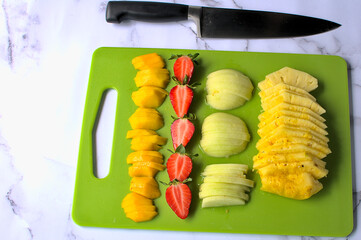 Preparing fruit salad