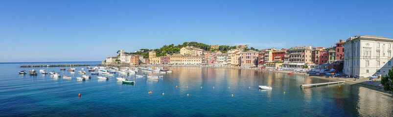 Fototapeta na wymiar Panoramic aerial view of the Bay of Silence in Sestri Levante with many colored houses