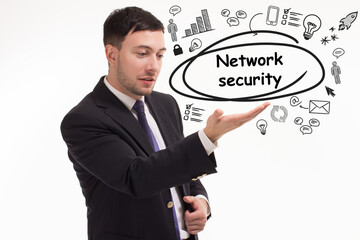 Business, technology, internet and network concept. Young businessman thinks over the steps for successful growth: Network security