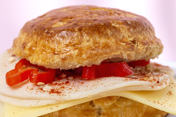 Assortment of homemade scones with ham, cheese, avocado, salmon, cream cheese and strawberry jam