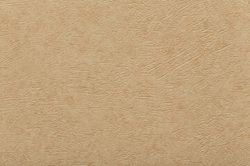 Beige, orange, plaster. Stucco relief. Rough background and texture.