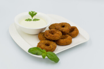 Ried Falafel with sause on white background