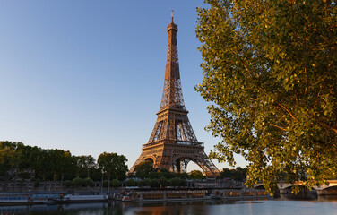 Fototapeta na wymiar Eiffel Tower, iconic Paris landmark with vibrant blue sky