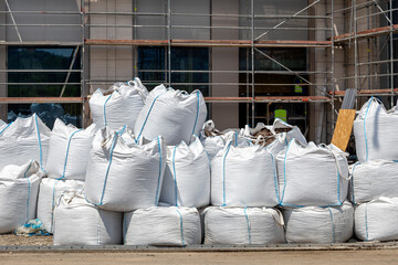 Sacks with construction waste on the street