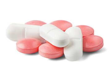 pile of medical pills on isolated white background. Pattern for design.