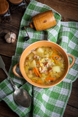 Pea soup with vegetables and bacon.