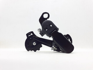Black Stylish Stainless Steel Rear Derailleur RD Bicycle Components for Chain Control in White Isolated Background © Yudhistira