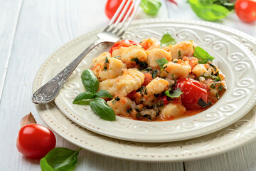 Traditional potato gnocchi with tomato sauce.