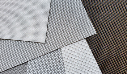 interior roller blind samples in various texture and color. roller blind using for sunproof and privacy.