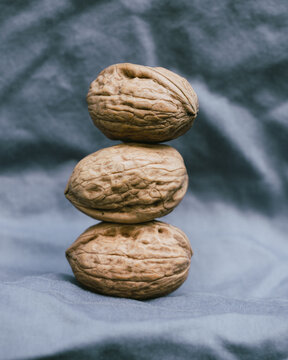 walnuts with grey fabric background