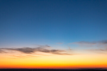 Sky at sunset with clouds, use as a background
