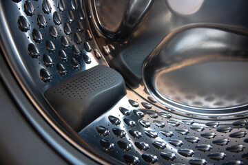 Inside the washing machine. The drum of the washing machine