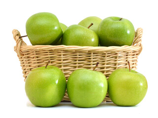 Green apples in basket on a white background