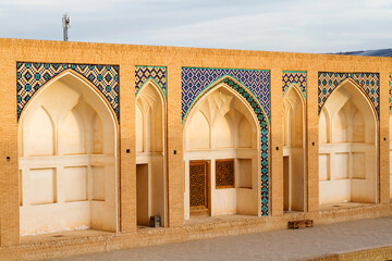 View of Agha Bozorg Mosque on blue sky background in Kashan, Iran. Gorgeous Islamic architecture....