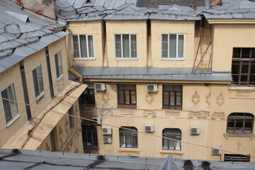 Saint-Petersburg, Russia - 10.06.20. Cityscape panorama of old central city part, view from a roof. Famous rooftops of St. Petersburg with Saint Isaac's Cathedralat the background.