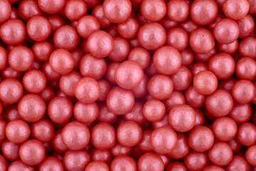 Pink candies abstract background, copy space. Sweets texture. Top view, flat lay