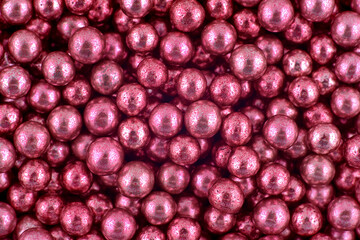 Pink candies abstract background, copy space. Sweets texture. Top view, flat lay