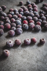 frozen blueberries on a slate
