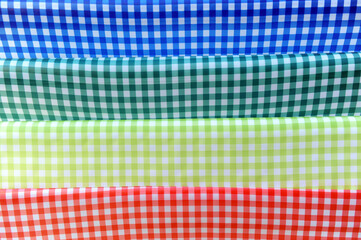 Checkered table cloths. Textile texture and background of squares