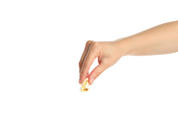 Female hand holds popcorn, isolated on white background