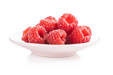Ripe red raspberries on plate