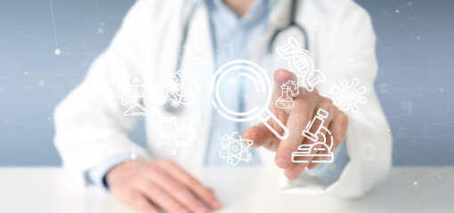 Fototapeta premium Doctor pointing using a stethoscope at the clinic