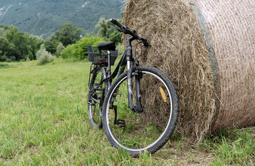 bicycle placed on a bale of hay  Outdoor life concept
