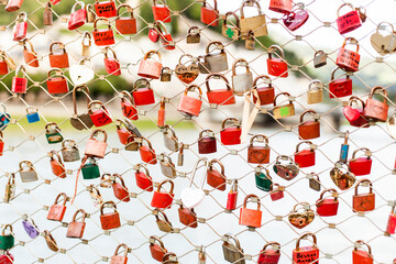 Padlocks for friendship and love locked on bridge. Vorhängeschlösser für Freundschaft und Liebe...